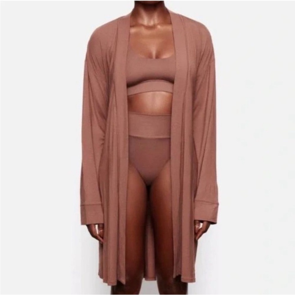 Skims brown robe